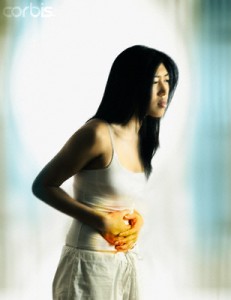 Woman with cramps and brown discharge