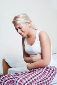 Black discharge and cramps