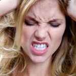 woman pulling hair negative stress