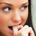 Black vaginal discharge between periods